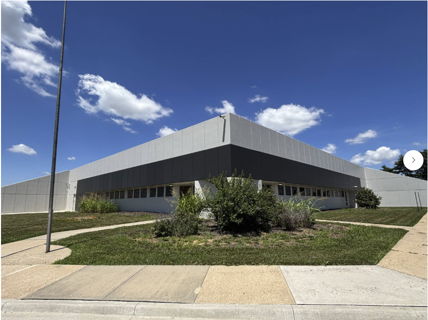 Building exterior — wide-angle view from parking lot