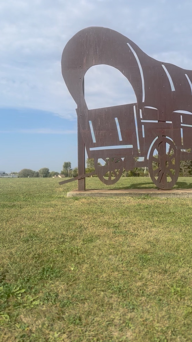 Neighboring landmark — covered wagon sculpture